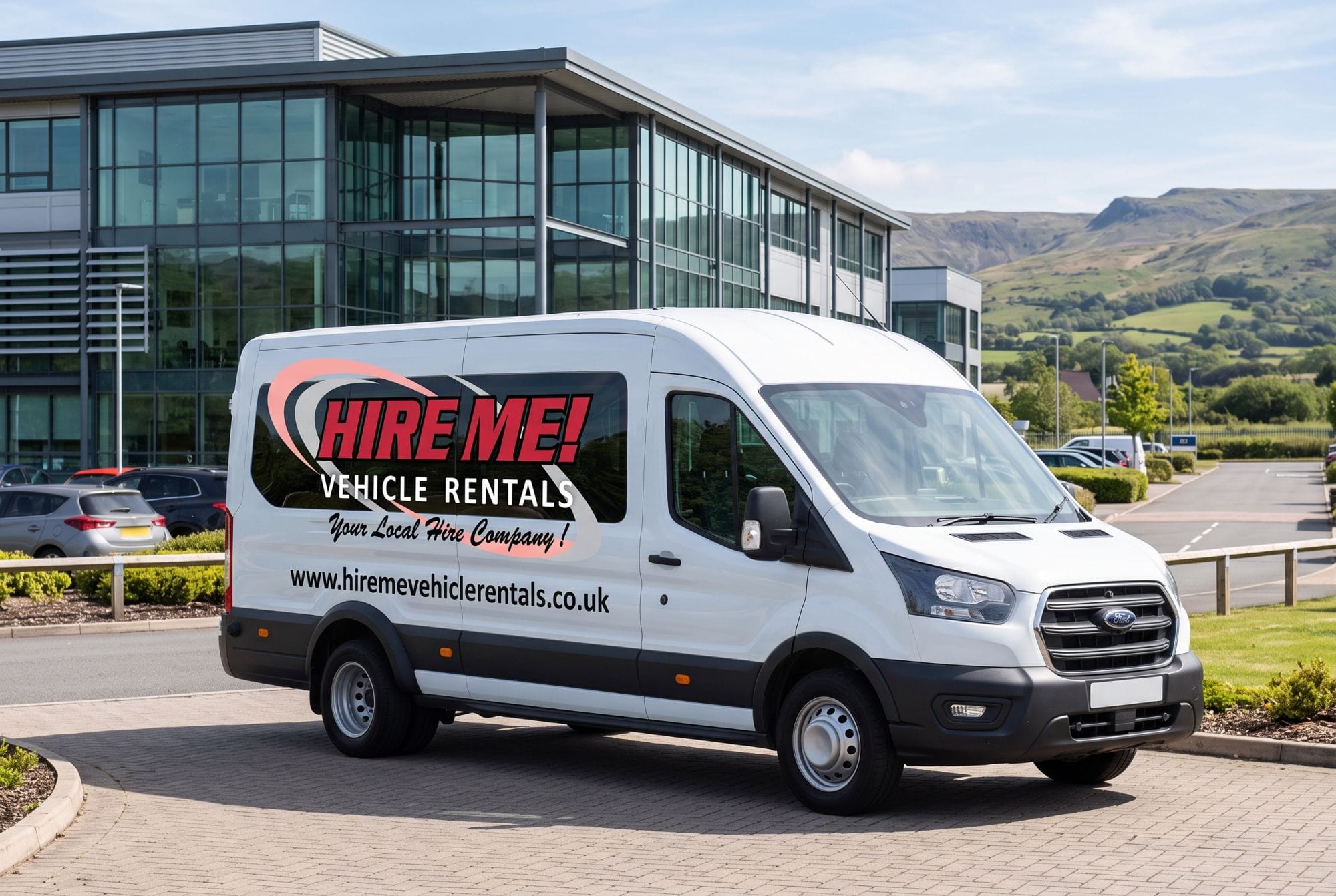 A corporate hire minibus with Hire Me! Vehicle Rentals branding parked outside a business park, showing minibus options for business and group travel.